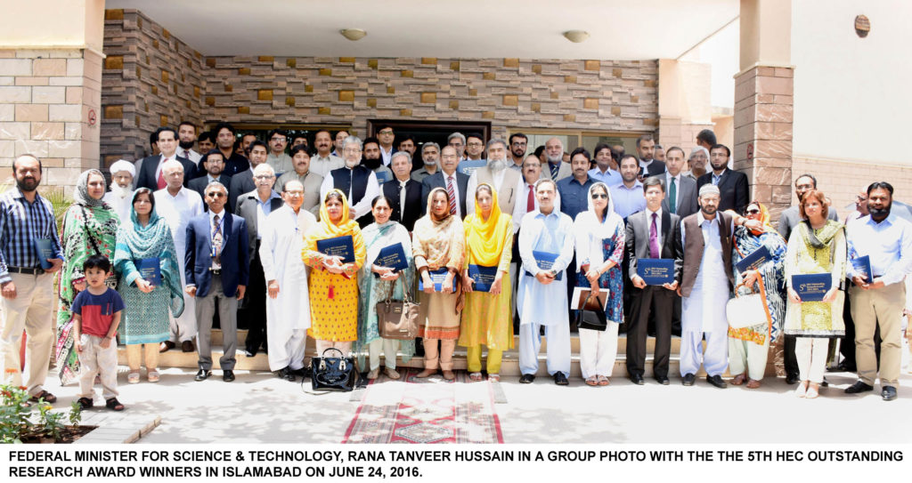 FEDERAL MINISTER FOR SCIENCE & TECHNOLOGY, RANA TANVEER HUSSAIN IN A GROUP PHOTO WITH THE THE 5TH HEC OUTSTANDING RESEARCH AWARD WINNERS IN ISLAMABAD ON JUNE 24, 2016.
