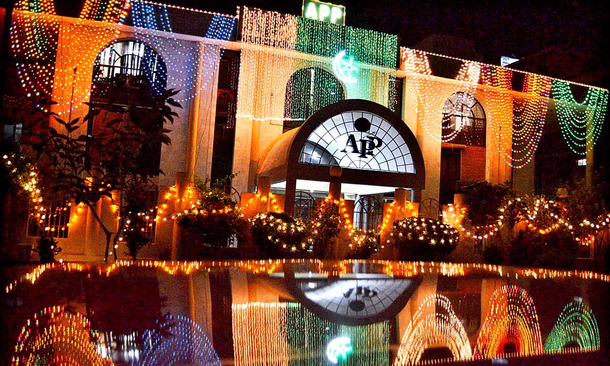 APP58-13 ISLAMABAD: August 13 – An illuminated view of APP Headquarters’ building decorated with colourful lights in connection with Independence Day celebrations. APP photo by Mohammad Ali